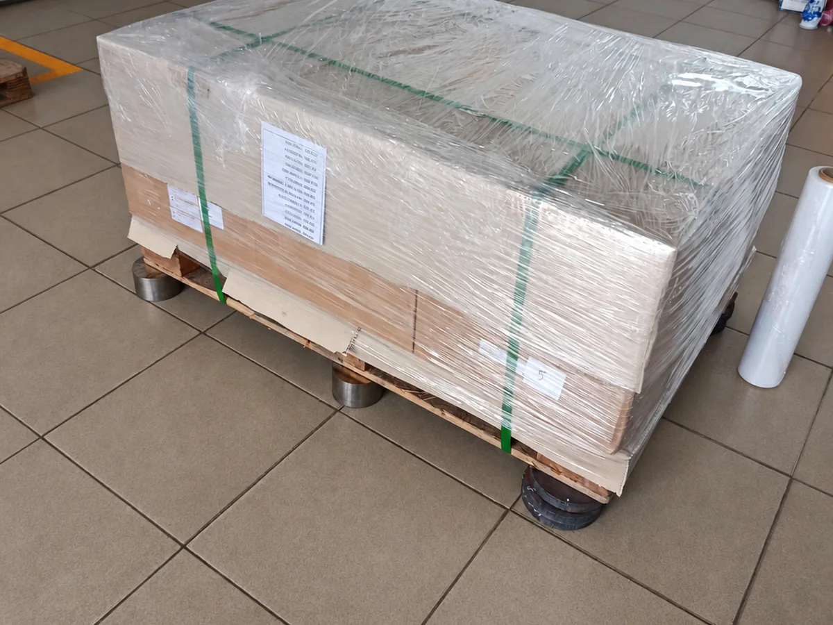 Parts packed, wrapped and strapped on an export pallet.